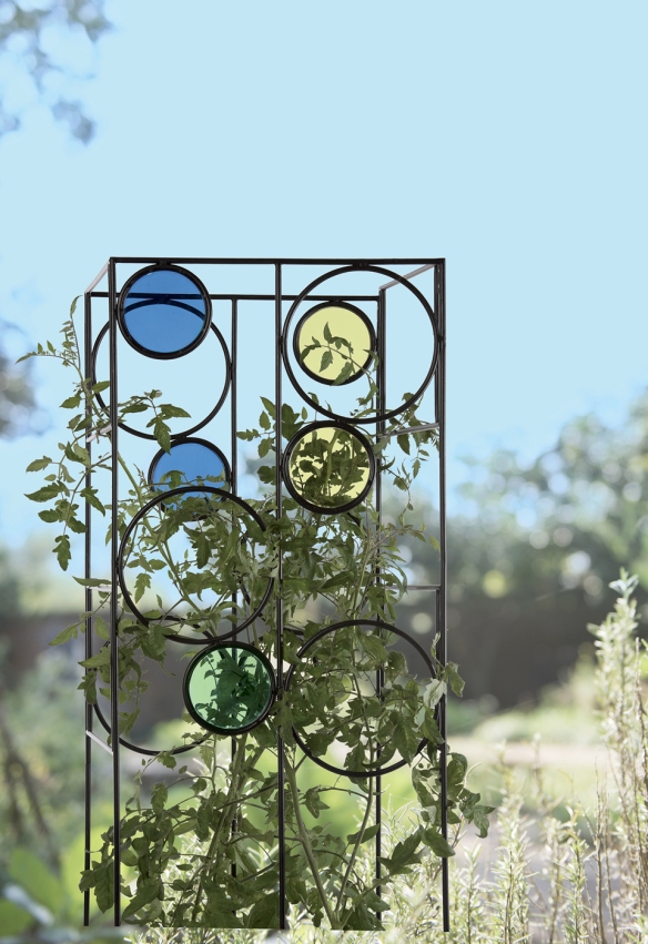 Gardener’s Supply Company The Kaleidoscope Tomato Cage provides a sturdy support for tomato plants while adding color to the landscape